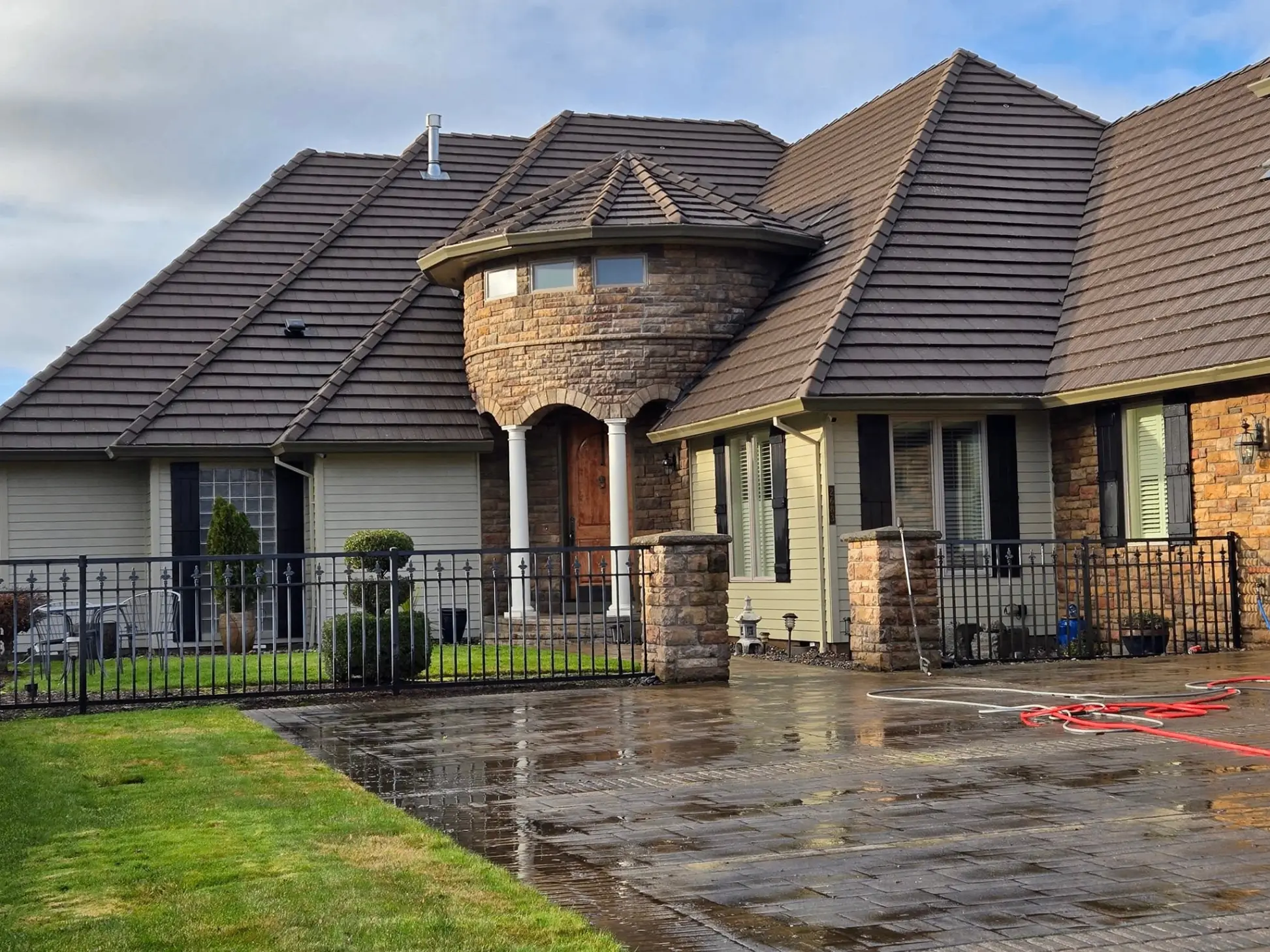 Clean asphalt shingle roof after moss treatment